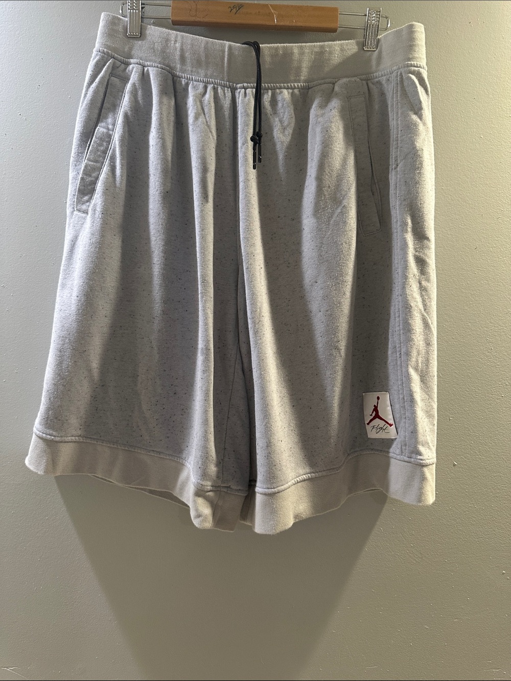 Jordan Men’s Light Gray Athletic Fleece Shorts with Red Jumpman Patch